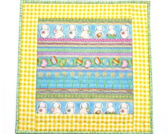 Easter Table Topper: quilted table mat with bunnies and Easter eggs, large square candle mat in spring colors, holiday table decor