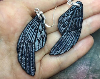 Hand tooled leather raven wings earrings with sterling silver hooks - Artisan fantasy earrings