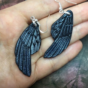 Hand tooled leather raven wings earrings with sterling silver hooks - Artisan fantasy earrings