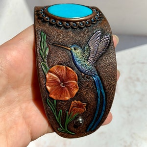 Tooled leather hummingbird bracelet - Hand painted leather cuff bracelet with turquoise cabochon and hummingbirds with iridescent sheen