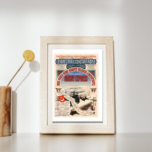 Può includere: Poster di viaggio vintage incorniciato per il treno Orient Express, con testo in francese e inglese. Il poster ha uno sfondo color crema con un'illustrazione dettagliata di un paesaggio urbano e una bandiera turca. La cornice è in legno chiaro.