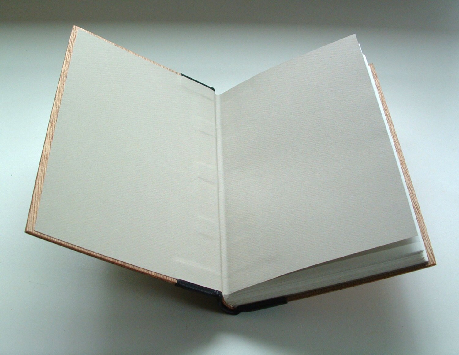 Handmade book bound in black or brown leather and wood with Etsy