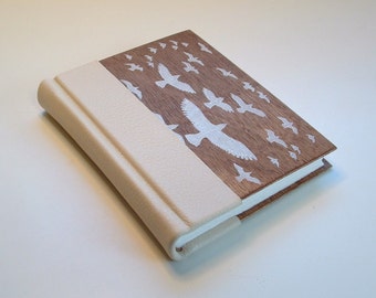 Handmade book, bound in cream leather and wood, with original block print art on cover. Blank book, journal, diary, sketchbook.