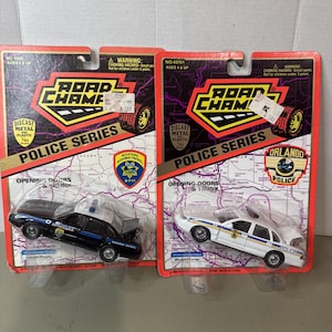 2pc Road Champs 1/43 scale Diecast Police Orlando And Montana Ford Crown Vic