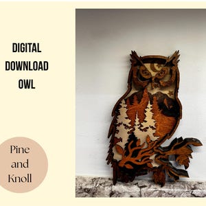 May include: Wooden owl wall art with a layered design, featuring a forest scene within its silhouette. The owl is perched on a branch, with the text "DIGITAL DOWNLOAD OWL" and "Pine and Knoll" visible.