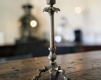 1850 Victorian Silver plated candlestick holder. Tripod lion legs.