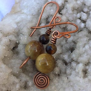 Tigers eye earrings with antique copper coils
