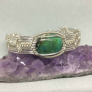 Unique silver plated bracelet wire weaved bracelet with a lovely turquoise cabochon as the center piece