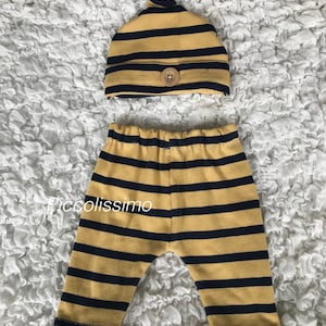 16” mustard and navy trousers and hat