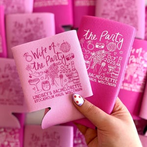 May include: Pink and fuchsia can coolers with white text and illustrations. One cooler reads "Wife of the Party" and the other reads "The Party". Both include the date "OCT 2025" and "Lindsey's Bachelorette".