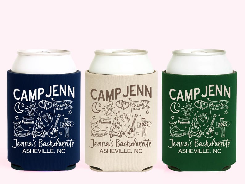 May include: Three camp-themed can coolers in navy blue, beige, and green. Each cooler features the text 'CAMP JENN' in white or brown, along with camping-related illustrations like a moon, lantern, campfire, guitar, and '2025.' The text 'Jenna's Bachelorette' and 'ASHEVILLE, NC' are also present.