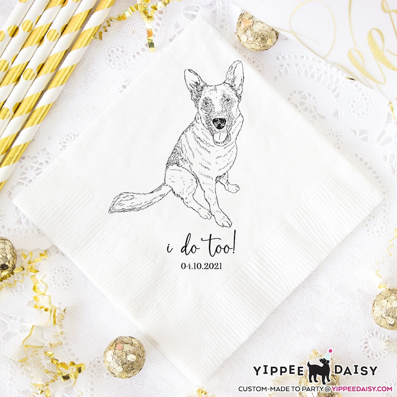 May include: White wedding napkin with a black and white line drawing of a dog sitting. The text "i do too! 04.10.2021" is printed below the dog.