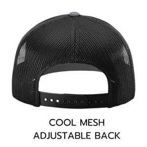 May include: Black mesh trucker hat with an adjustable back strap. The strap has the word "RICHARDSON" printed on it.