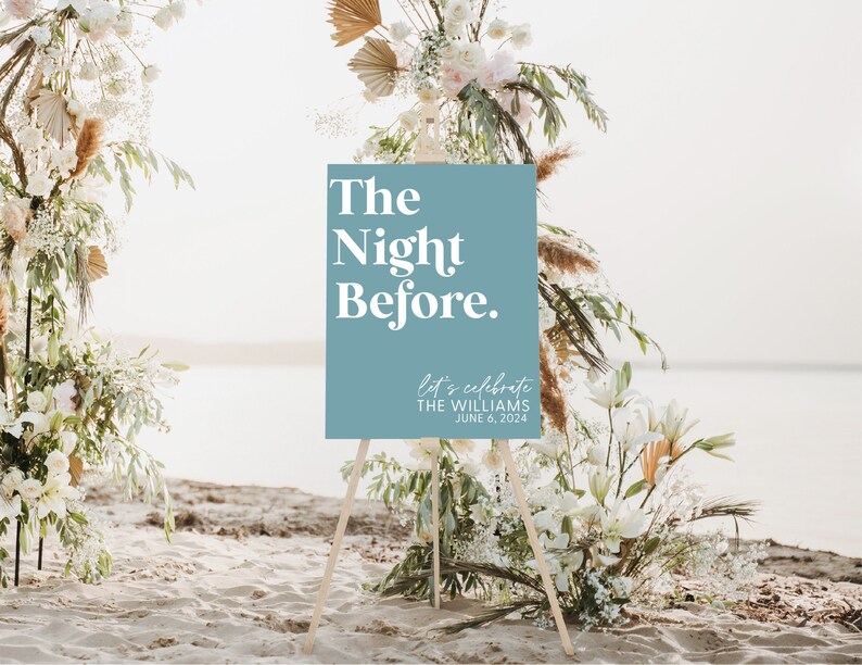 the night before wedding reception entry sign in dusk blue with white text