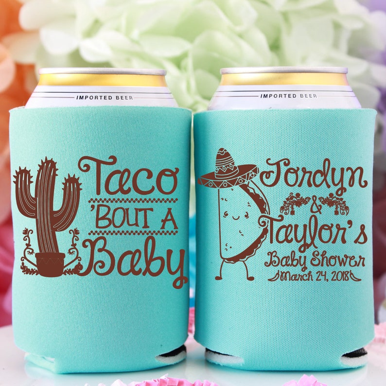 May include: Two turquoise blue can coolers with brown text and graphics. The left cooler has a cactus and the text 'Taco 'Bout A Baby'. The right cooler has a taco with a sombrero and the text 'Jordyn & Taylor's Baby Shower March 24, 2018'.