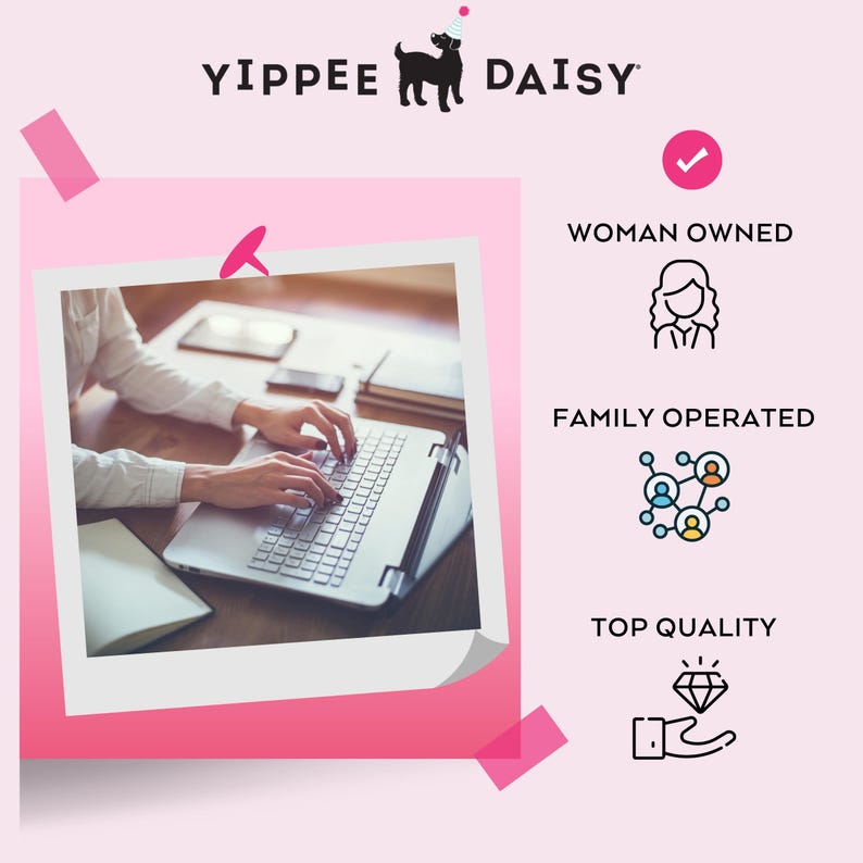 a woman is typing on a laptop computer