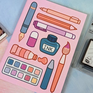 Livre d'autocollants - Outils artistiques | Album d'autocollants A5 avec papier protecteur