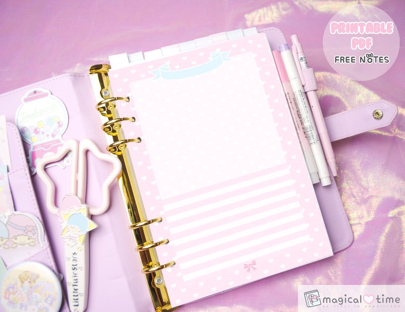 May include: A pink and white printable planner page with a gold binder and a pink and white polka dot design. The page has a title that says "Printable PDF Free Notes".
