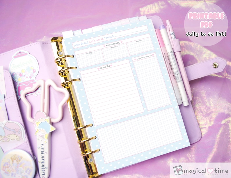 May include: A light blue daily planner with a white polka dot pattern and pink hearts. The planner has a section for a daily to-do list, a task summary, and a notes section. The planner is open and lying on a purple surface. The text "PRINTABLE PDF daily to do list!" is visible in the upper right corner of the image.