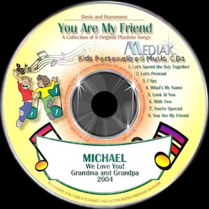 May include: A yellow and orange CD with a picture of two children on the front. The title of the CD is "You Are My Friend" and the text "Kids Personalized Music CDs" is also visible. The CD is personalized with the name "MICHAEL" and the text "We Love You! Grandma and Grandpa 2004".