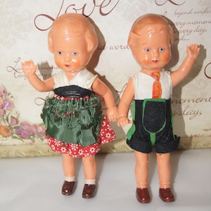 2 EDI Germany Boy and Girl Dolls .Vintage late 1930 German Celluloid. Vintage dolls