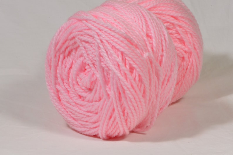 May include: A pink ball of yarn.