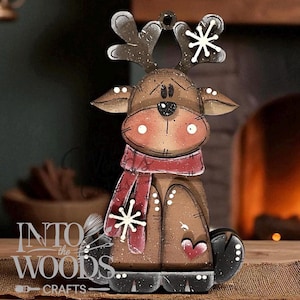 May include: Wooden reindeer Christmas ornament with a red scarf and snowflake accents. The reindeer has a brown body, antlers, and a heart detail. The ornament has the text "Into the Woods Crafts" at the bottom.