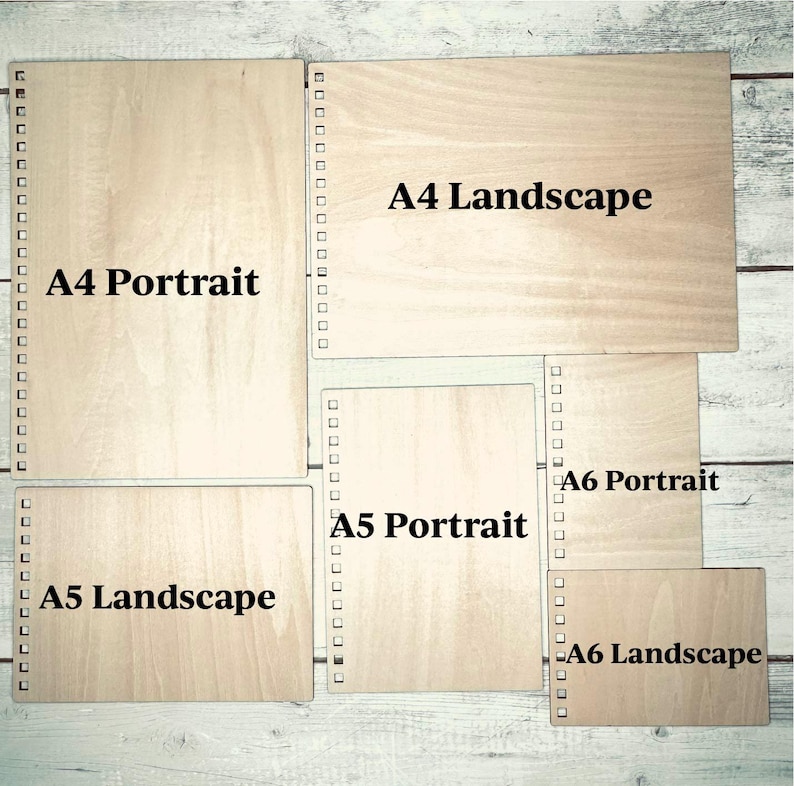 May include: A wood board with different sizes of paper cutouts labeled with their sizes and orientations. The sizes are A4, A5, and A6. The orientations are portrait and landscape.