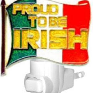 May include: A white night light with a switch on the side. The front of the night light features a green, white, and red Irish flag with the words "Proud to be Irish" in gold letters.