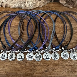 Mythical SciFi Bracelet - Big Foot Mothman Waterproof Adjustable Cord Charm Bracelet - UFO Jackalope Loch Ness Monster Nerdy Cryptid Lover - Handcrafted Unique Silver Charms with Sasquatch Bigfoot hand stamped for men women and children