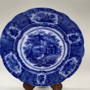 Oriental pattern Flow Blue Plate