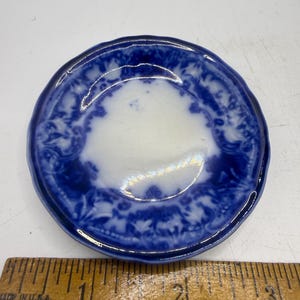 Flow Blue Butter Pat~John Maddocks Dainty pattern.