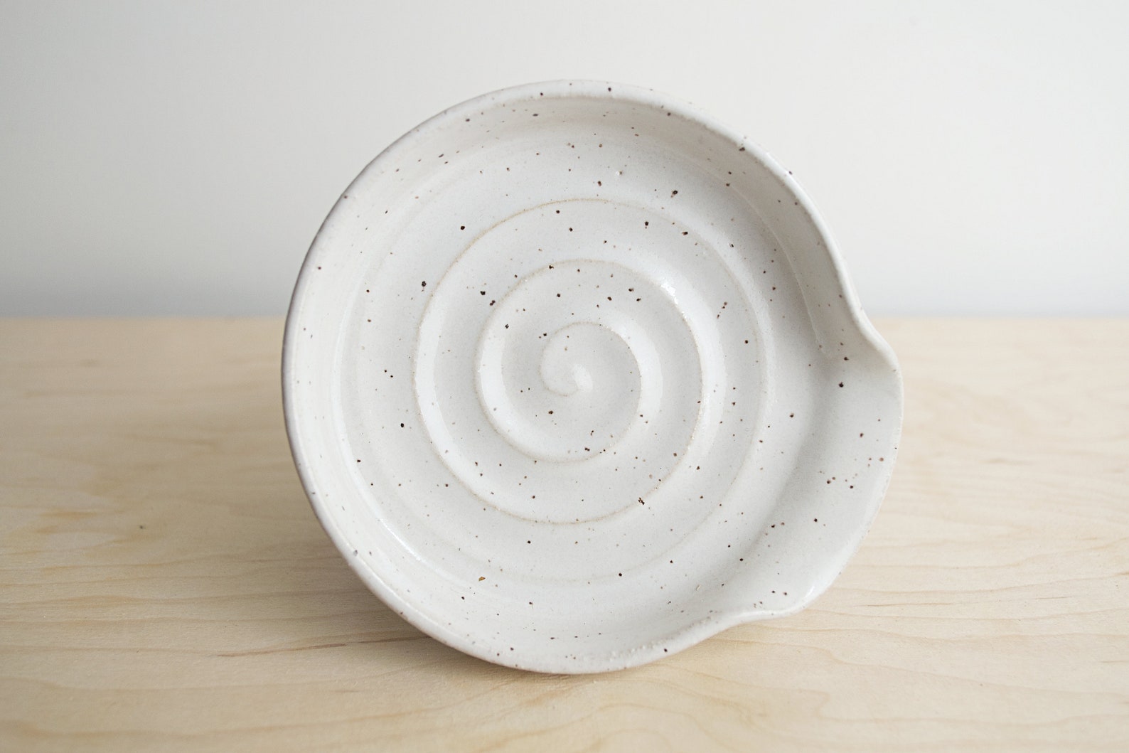 Speckled White Ceramic Spoon Rest – Modern Pottery, Neutral Stovetop Utensil Holder - Swirl