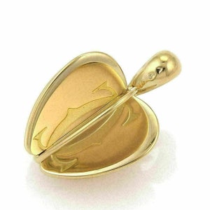 19655 - Cartier 6 Parts Double C Reflective 18k Yellow Gold Apple Pendant
