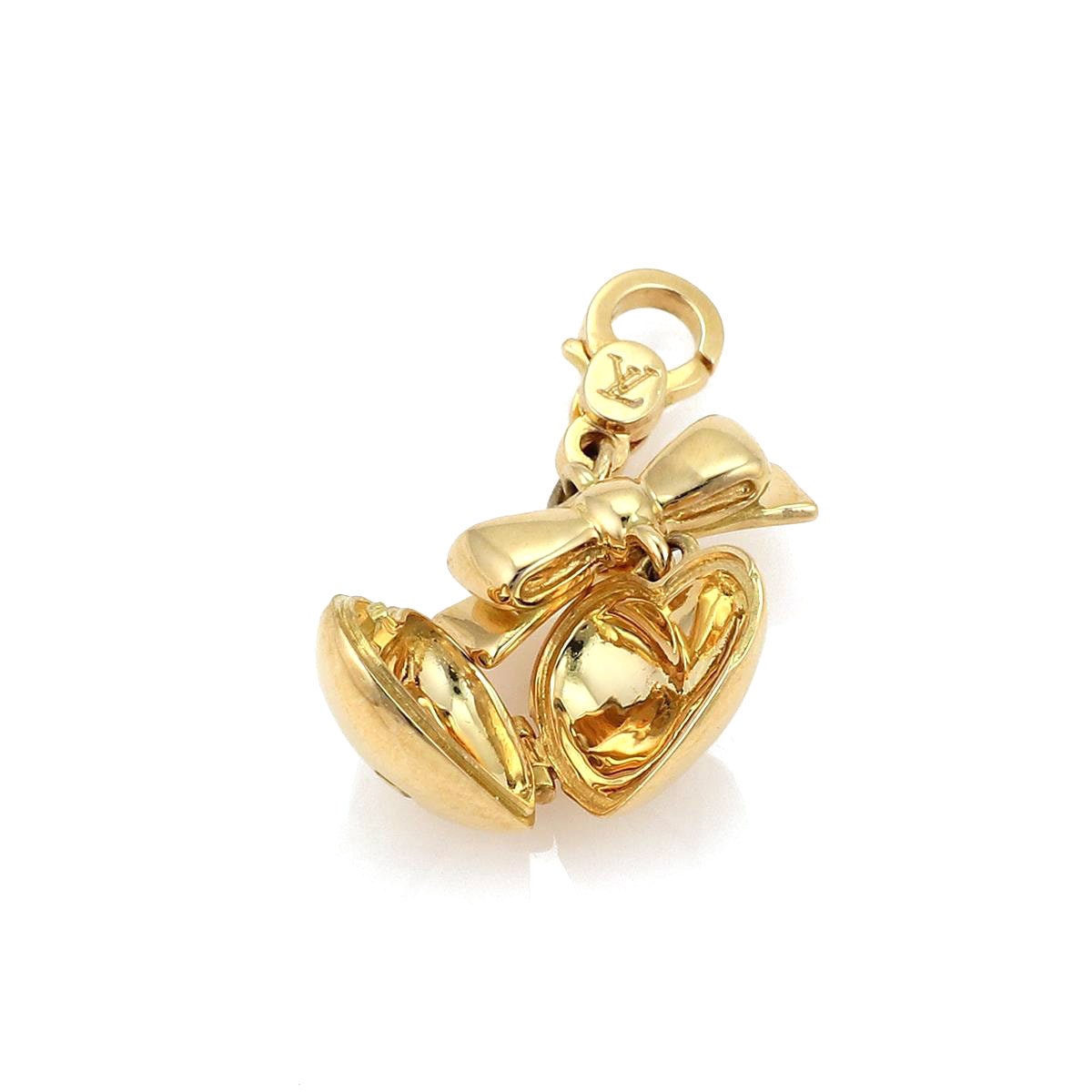 22166 Authentic Louis Vuitton Heart & Bow Locket 18k Yellow -  Finland
