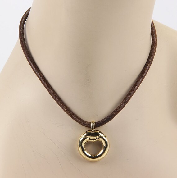 13913 Movado 18k Yellow Gold Heart Pendant Leather Cord Necklace