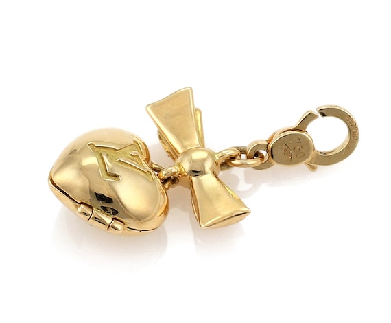 MAGNIFICENT LOUIS VUITTON 18K GOLD CHARM LUGGAGE BRACELET "7