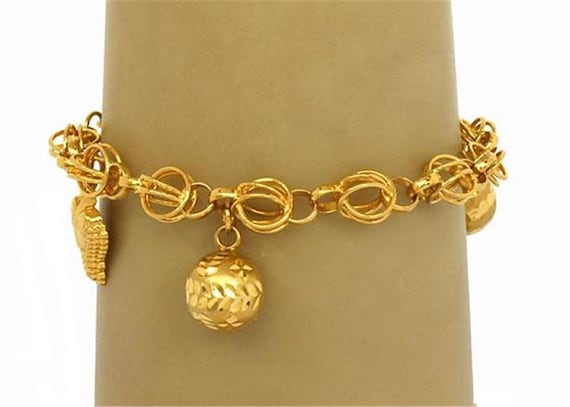 11540 - Dangling Charms Bracelet in 21k Gold - image 2