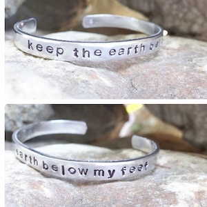 Hand stamped Aluminum bracelet/cuff &quot;keep the earth below my feet&quot; inspired by Mumford & Sons