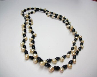 Ebony and Ivory Pearl Necklace with Black Clasp