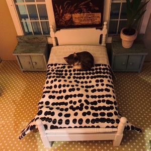 White dollhouse bed