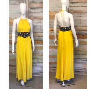A lovely canary yellow Ossie Clark halter neck maxi with Celia Birtwell print. 8/10
