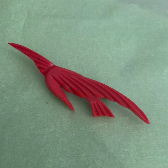 1940's red "bird" brooch.