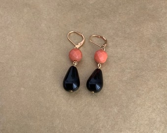 Black and coral colored earrings.