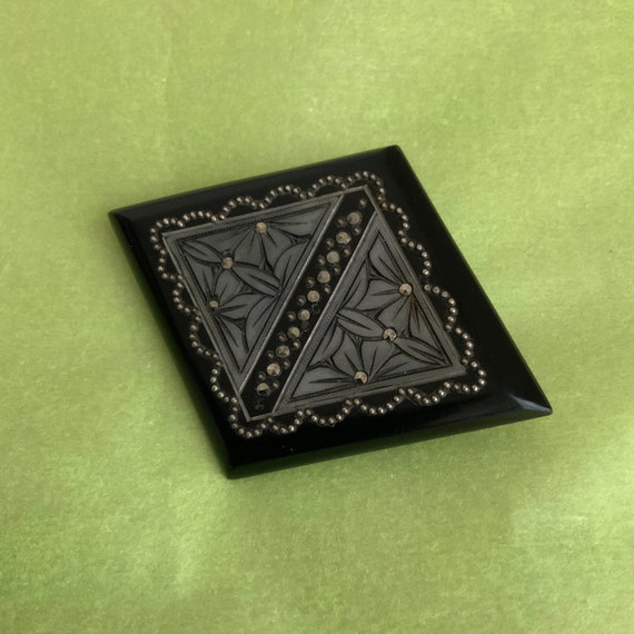 1930’s black brooch.