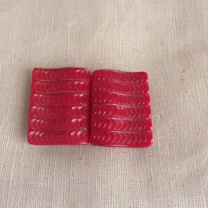 1930&#39;s red belt buckle.