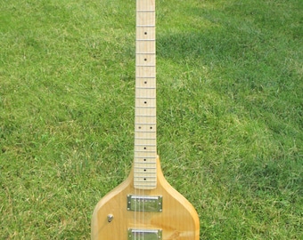 Modelo Comet, guitarra eléctrica hecha a mano.