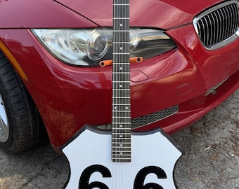 Guitarra eléctrica Route 66: novedosa, única y hecha a mano