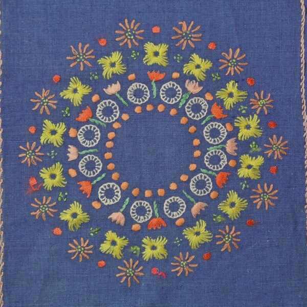 Very well done swedish vintage 1950s handmade multicolor flat-seam flower circle embroidery on blue linen table-cloth runner