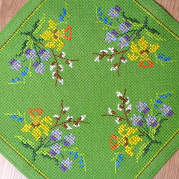 Vintage 1960s handmade cross-stitch embroidery on thicker green cotton aida fabric table-cloth with easter flower motive